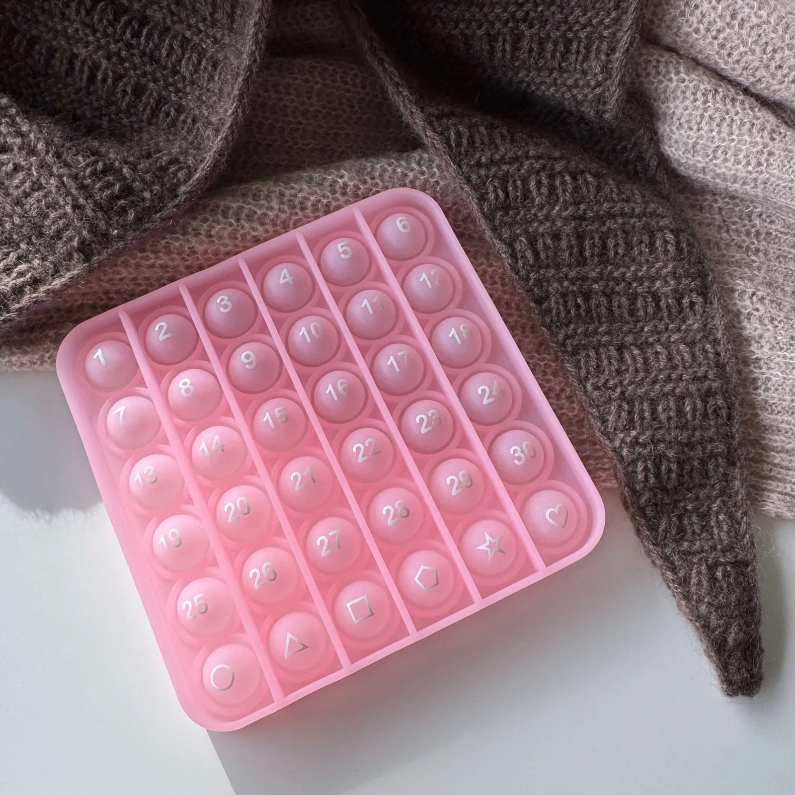 Pop-it tæller i rosa