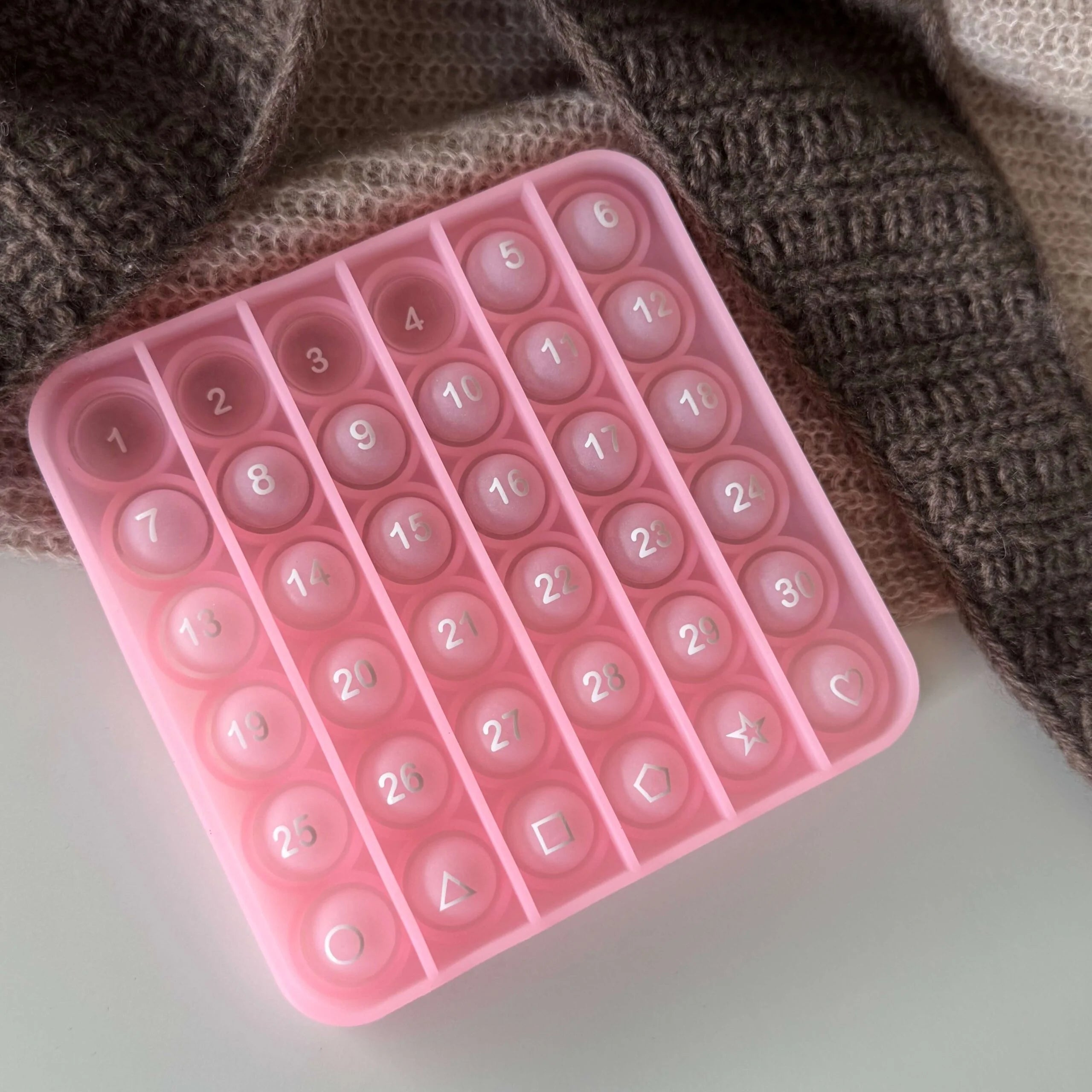 Pop-it tæller i rosa